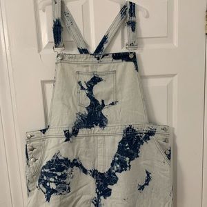 Medium washed overall shorts from Fashion Nova.